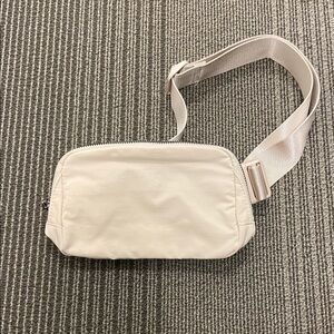 FREE Cream Belt Bag (FREE W/ANOTHER PURCHASE)